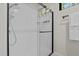 Modern shower featuring a glass door and black hardware at 1368 Ohio Ln, Sanford, NC 27332