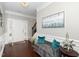Welcoming foyer with hardwood floors, elegant decor, and stairway at 140 Torrey Heights Ln, Durham, NC 27703