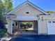 Attached garage with convenient access and extra parking at 1521 Providence Glen Dr # 1521, Chapel Hill, NC 27514