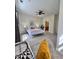 Spacious bedroom with a ceiling fan, a queen bed, and view of the connected bathroom at 1521 Providence Glen Dr # 1521, Chapel Hill, NC 27514