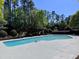Inviting community pool area offers a relaxing space to enjoy a sunny day with pergola at 1521 Providence Glen Dr # 1521, Chapel Hill, NC 27514