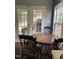 Charming dining area featuring French doors and a large window for plenty of natural light at 158 Randolph Dr, Clayton, NC 27520