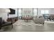 Spacious living room features modern furniture, a stylish rug, and ample natural light at 16 Saintsbury Dr, Fuquay Varina, NC 27526