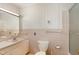 Classic bathroom with pink tile, a vanity, toilet and shower at 1750 Spring Valley Lake Rd, Henderson, NC 27537
