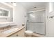 Modern bathroom with a glass-enclosed shower and updated fixtures, offering a sleek and functional design at 1750 Spring Valley Lake Rd, Henderson, NC 27537