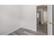Cozy bedroom with modern gray floors and an open doorway at 1808 Elkpark Dr, Raleigh, NC 27610
