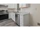 Bright kitchen features stainless steel appliances, modern cabinets, and stylish countertops, perfect for cooking and entertaining at 1808 Elkpark Dr, Raleigh, NC 27610