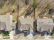 Aerial showcasing residences with well-kept landscaping, yards and neighborhood layout at 1911 Firenza Dr, Apex, NC 27502