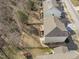 Aerial view highlighting backyard and patios, showcasing outdoor living at 1911 Firenza Dr, Apex, NC 27502