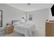 Bedroom featuring a double bed, nightstand, and natural lighting at 1911 Firenza Dr, Apex, NC 27502