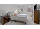 Bedroom with carpet, neutral walls, and two windows at 1911 Firenza Dr, Apex, NC 27502