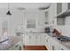 Bright kitchen showcases granite counters, stainless appliances, and a seamless connection to dining area at 1911 Firenza Dr, Apex, NC 27502