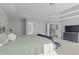 Spacious main bedroom features a tray ceiling and ensuite bathroom at 1911 Firenza Dr, Apex, NC 27502