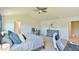 Bedroom with beige carpet, vaulted ceiling and a ceiling fan at 2065 Alderman Way, Creedmoor, NC 27522