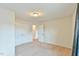 Bedroom featuring carpet floors, a double door closet, and access to the ensuite bathroom at 2065 Alderman Way, Creedmoor, NC 27522