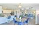 Open-concept kitchen and living room with modern appliances and stylish decor create inviting space at 2065 Alderman Way, Creedmoor, NC 27522