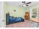 Charming bedroom with a window desk and a ceiling fan at 2108 Canterbury Rd, Clayton, NC 27520