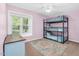 Charming bedroom with a triple bunk, and a rug at 2108 Canterbury Rd, Clayton, NC 27520