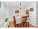 Charming dining room with hardwood floors, classic chandelier, and inviting atmosphere at 2108 Canterbury Rd, Clayton, NC 27520