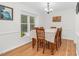 Inviting dining room with hardwood floors and ample natural light, perfect for Gathering gatherings at 2108 Canterbury Rd, Clayton, NC 27520