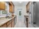 Functional kitchen featuring granite countertops, stainless steel appliances, and ample cabinet space at 2108 Canterbury Rd, Clayton, NC 27520