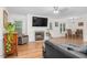 Comfortable living room with a fireplace, and open layout to the dining area at 2108 Canterbury Rd, Clayton, NC 27520