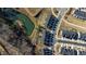 The aerial view captures the charming, well-planned community with its pristine pond and manicured landscaping at 2137 Caen St, Raleigh, NC 27610