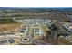 This is an aerial view of the community featuring mature tree coverage and proximity to local highways at 2137 Caen St, Raleigh, NC 27610