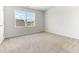 Bright, carpeted bedroom with a window offers a comfortable and serene space at 2137 Caen St, Raleigh, NC 27610