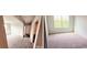 Neutral bedroom with soft carpet, a large window, and ample closet space at 2137 Caen St, Raleigh, NC 27610