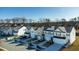 Charming townhomes featuring inviting front porches and manicured lawns at 2137 Caen St, Raleigh, NC 27610