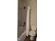 A tiled shower, toilet, and flooring in the bathroom shows the property's functional space with clean tile design at 220 Elizabeth St # A-17, Chapel Hill, NC 27514