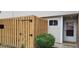 Exterior shot features a privacy fence, small garden, front door, and window at 220 Elizabeth St # A-17, Chapel Hill, NC 27514
