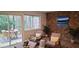 Outdoor patio with stylish seating and a serene view of the wooded backyard at 220 Elizabeth St # A-17, Chapel Hill, NC 27514