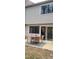 Outdoor patio with stylish furniture and a view into the interior living space at 220 Elizabeth St # A-17, Chapel Hill, NC 27514
