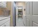 Hallway with access to laundry room, bathroom, and bedroom at 2456 Nealwood Ave, Graham, NC 27253
