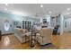 Bright living area featuring a fireplace with built-ins and hardwood floors at 2456 Nealwood Ave, Graham, NC 27253