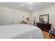 This bright and airy bedroom has ample storage and space for a sitting area at 2456 Nealwood Ave, Graham, NC 27253