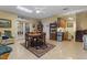 Large recreation room with kitchenette, dining area, tile floor, and access to many other rooms at 2456 Nealwood Ave, Graham, NC 27253