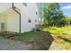 Backyard featuring lush greenery, back entrance and small staircase at 2801 Dearborn Dr # A, Durham, NC 27704