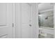 Bathroom featuring a glass-enclosed shower-tub at 2801 Dearborn Dr # A, Durham, NC 27704