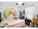 Inviting bedroom with hardwood floors, neutral walls, and a window for natural light at 2801 Dearborn Dr # A, Durham, NC 27704