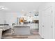Bright kitchen features granite countertops, stainless steel appliances, white cabinets, and hardwood flooring at 2801 Dearborn Dr # A, Durham, NC 27704