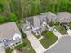 Aerial view of a two-story home with manicured lawn and a two car garage at 2812 Lemnos Dr, Apex, NC 27502