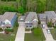 Aerial view of a two-story home with manicured lawn and a two car garage at 2812 Lemnos Dr, Apex, NC 27502