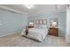 Serene bedroom featuring a comfortable bed, neutral colors, and ample natural light at 2812 Lemnos Dr, Apex, NC 27502
