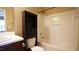 This bathroom features a toilet with shelving, a shower-tub, and a vanity with sink at 2945 Casona Way, Raleigh, NC 27616