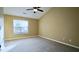 Spacious bedroom with plush carpeting and ample natural light at 2945 Casona Way, Raleigh, NC 27616