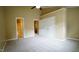 Comfortable bedroom with ceiling fan and walk-in closet access at 2945 Casona Way, Raleigh, NC 27616