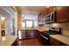 Well-equipped kitchen featuring stainless steel appliances and granite countertops at 2945 Casona Way, Raleigh, NC 27616